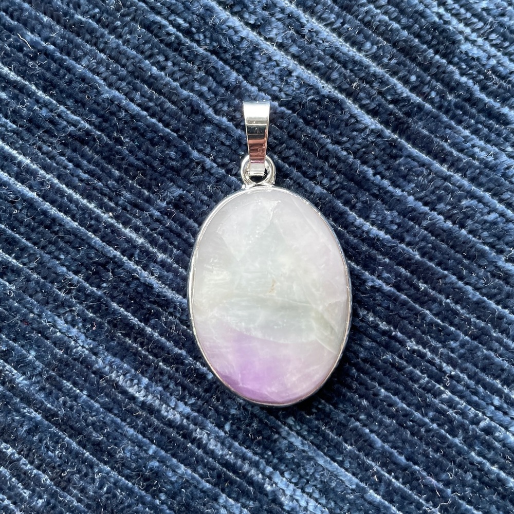 Gorgeous iridescent marbled stone pendant